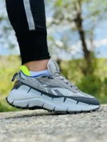 کفش ریباک مدل زیگ کینتیکا 2 رنگ طوسی