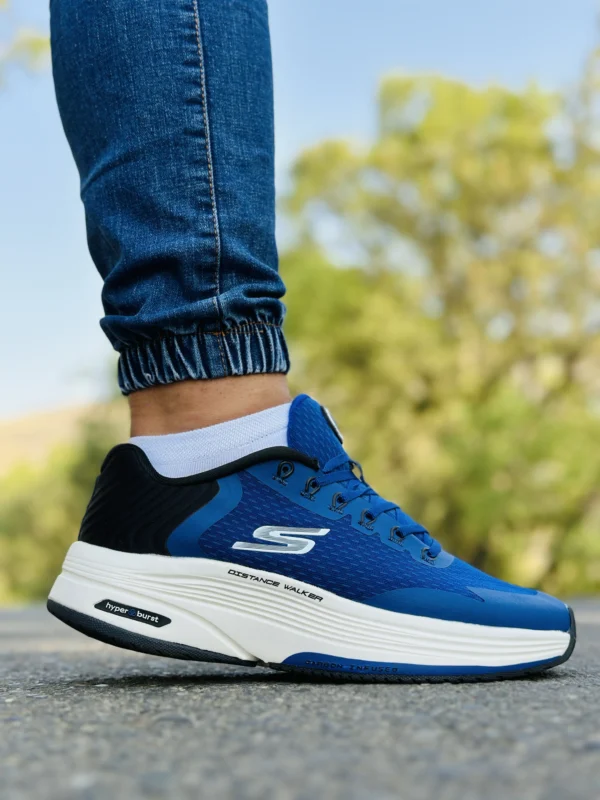 کتونی اسکیچرز DISTANCE WALKER رنگ سرمه ای با زیره سفید